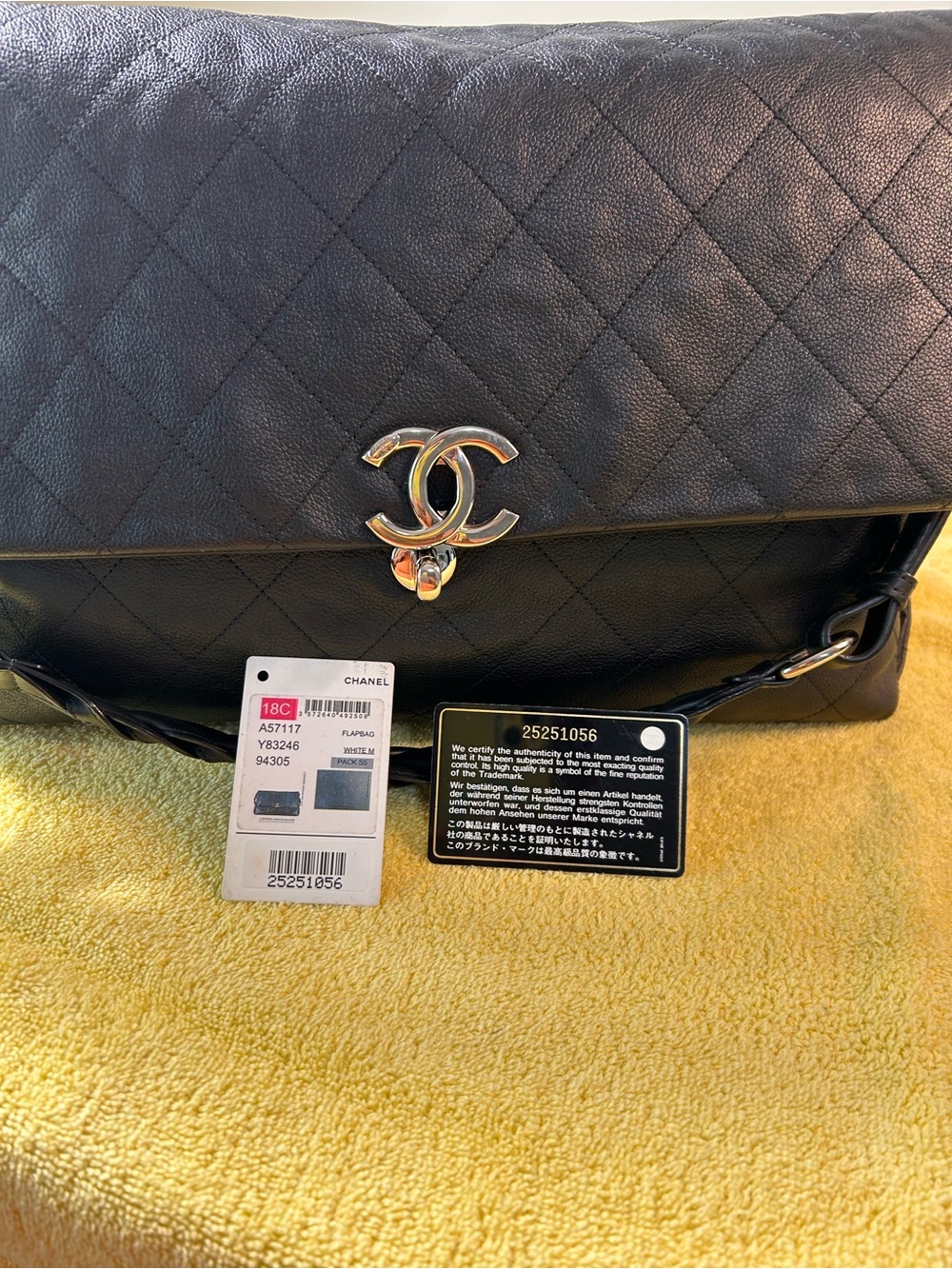 Authentic CHANEL Black Quilted Leather Shoulder Bag with Silver-Tone CC